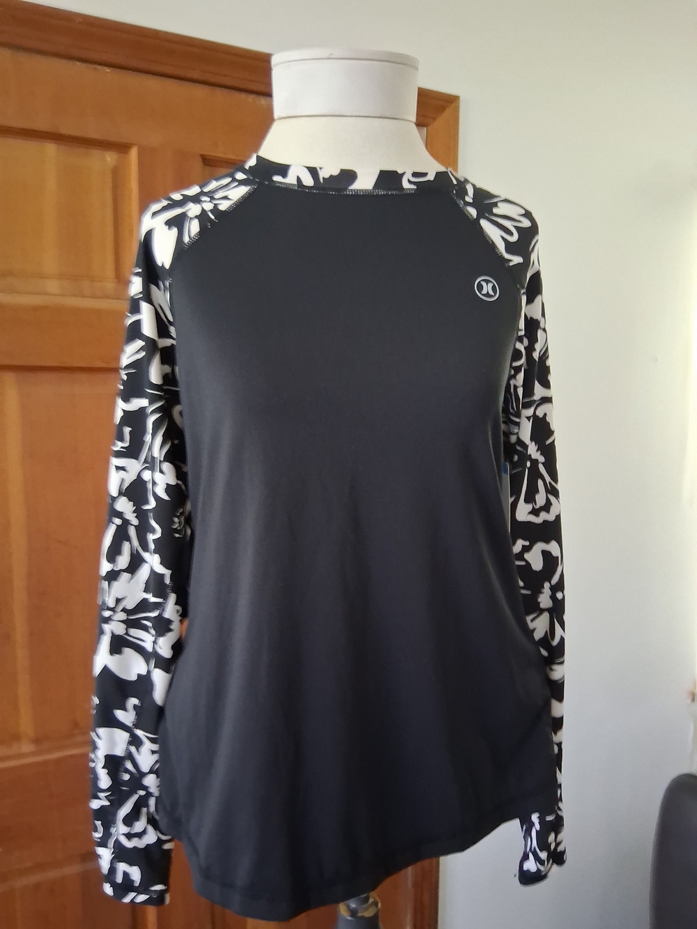 Hurley Black Top with Black-and-White Floral Raglan Sleeves